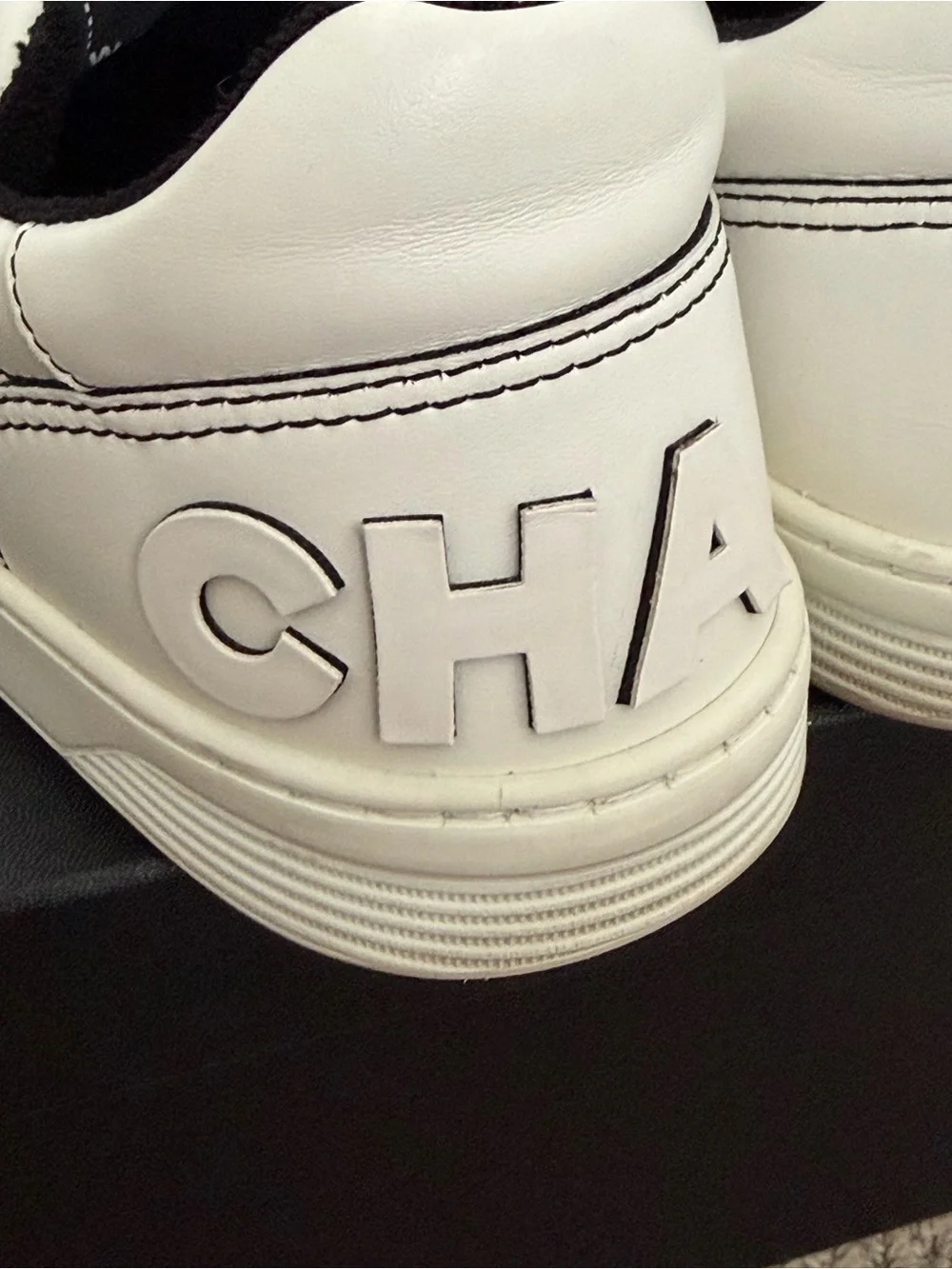 Chanel Women’s White/Black Leather Low-Top Sneakers